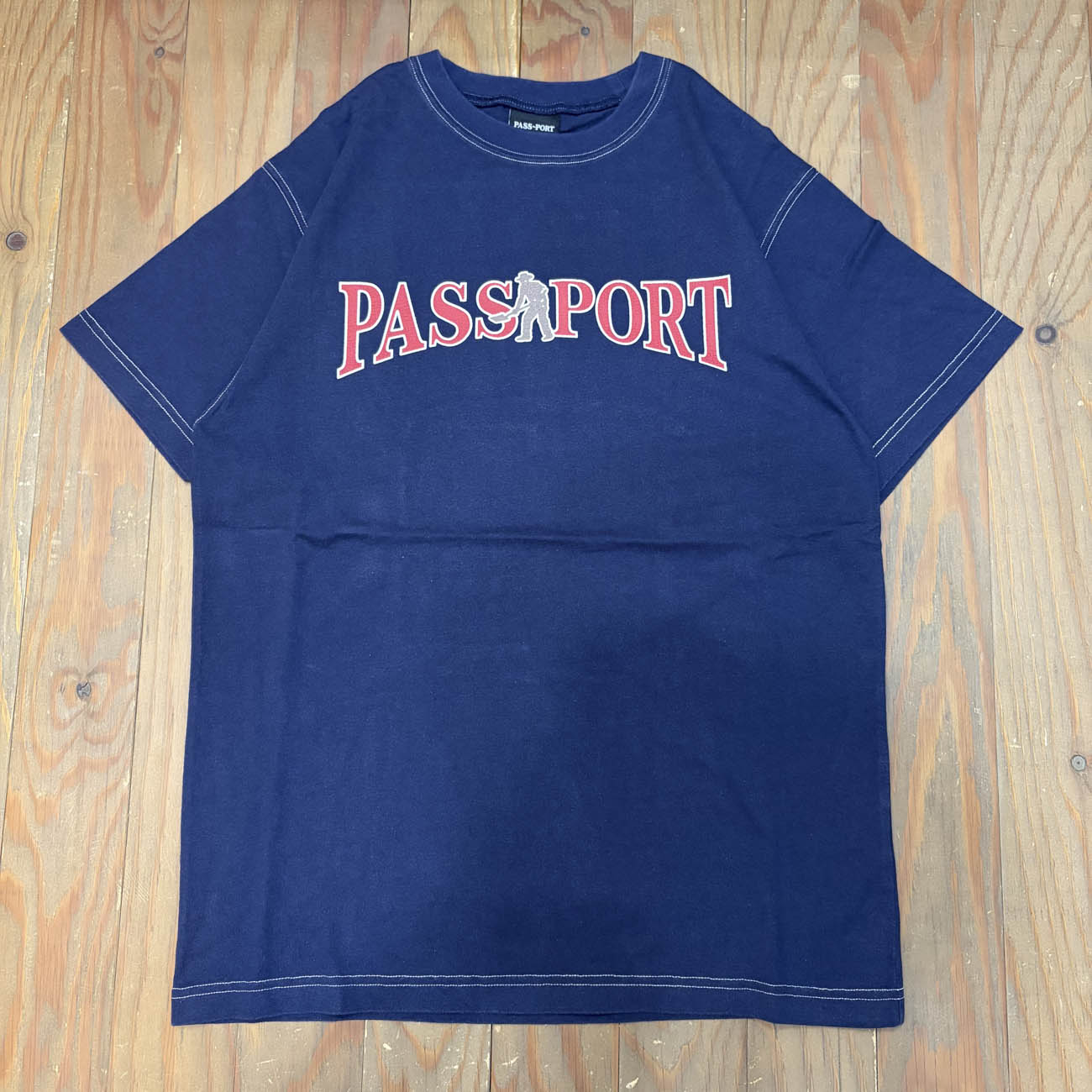 PASS~PORT OFFICIAL CONTRAST TEE