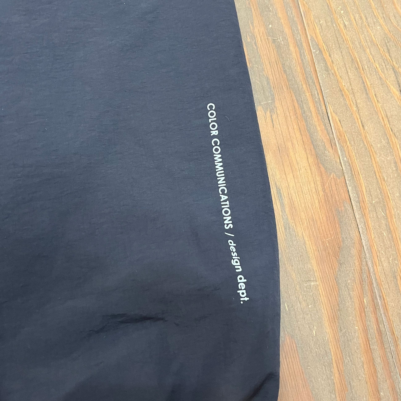 COLOR COMMUNICATIONS DRIP EMB LETTER NYLON