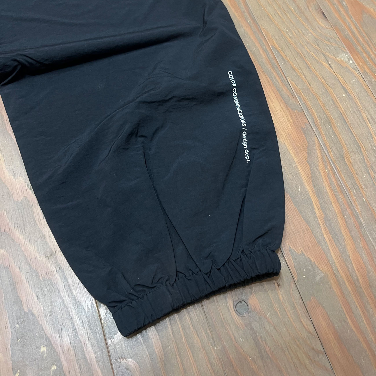 COLOR COMMUNICATIONS DRIP EMB LETTER NYLON