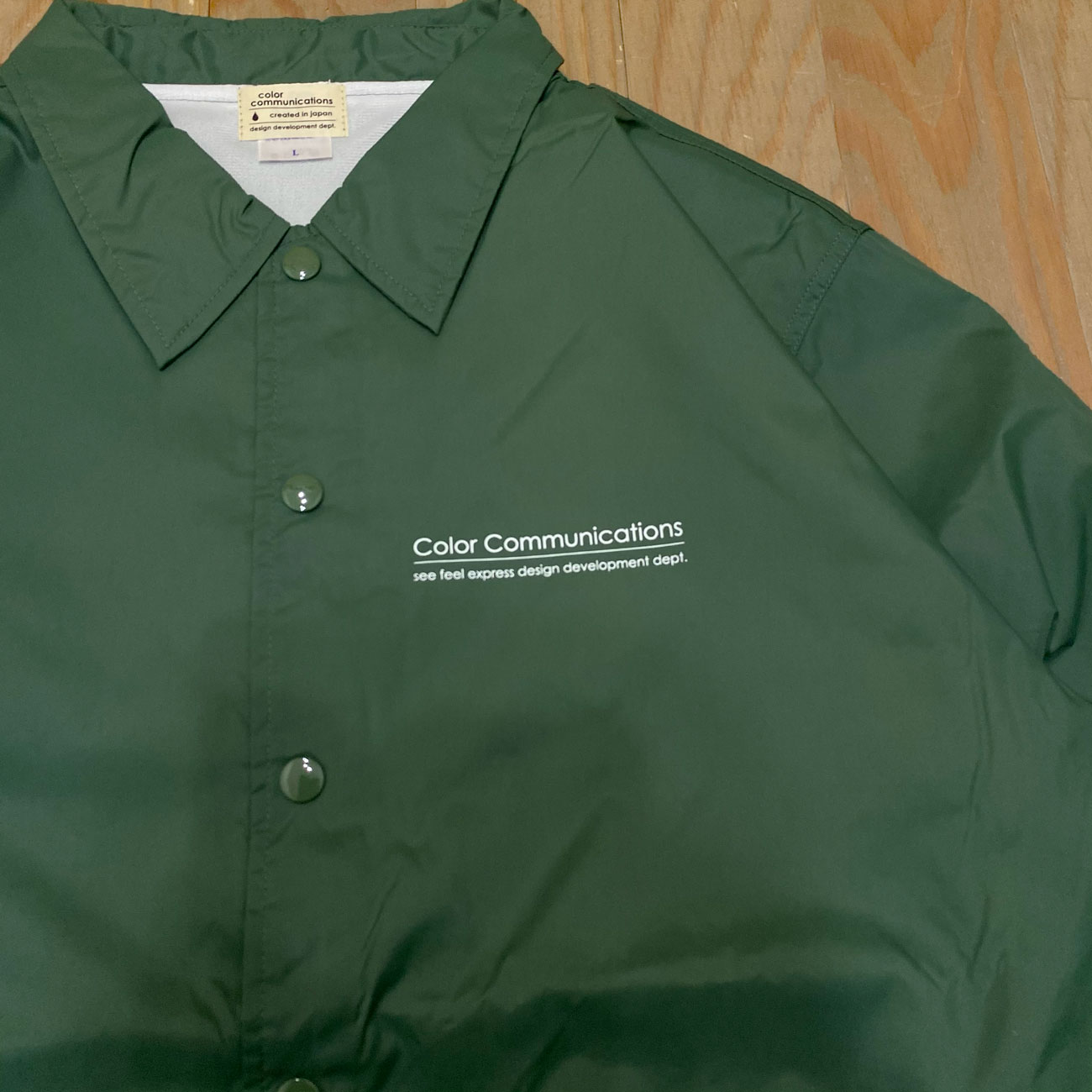 COLOR COMMUNICATIONS RE-LETTER 2012 COACH JACKET